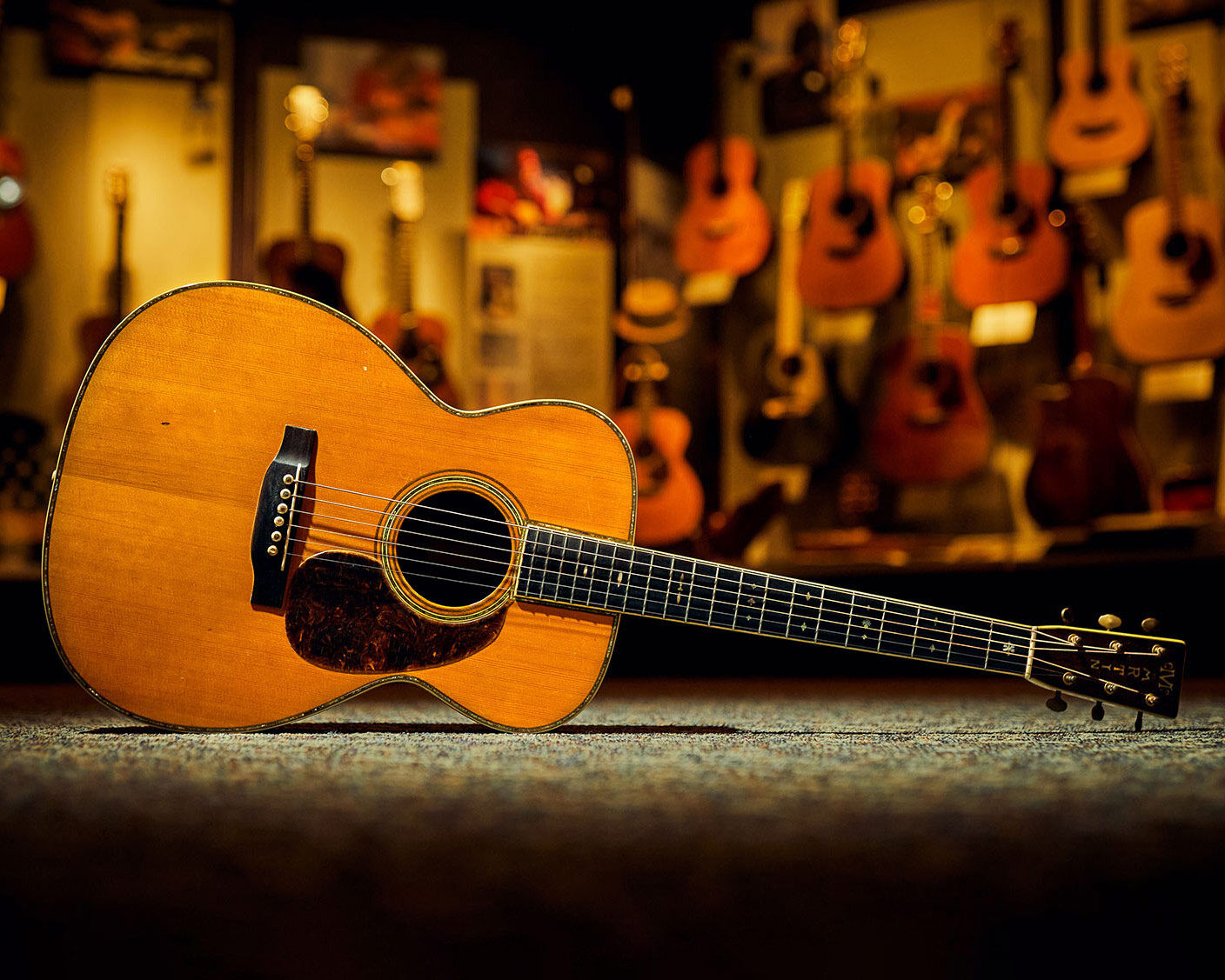 John's guitar on display at the Martin Museum