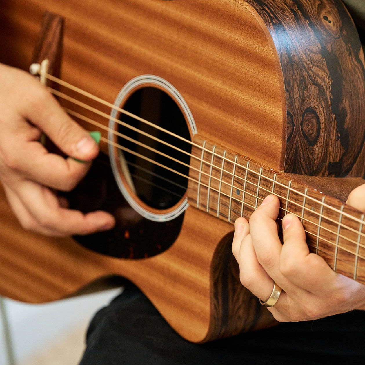 Close up of back of cutaway guitar