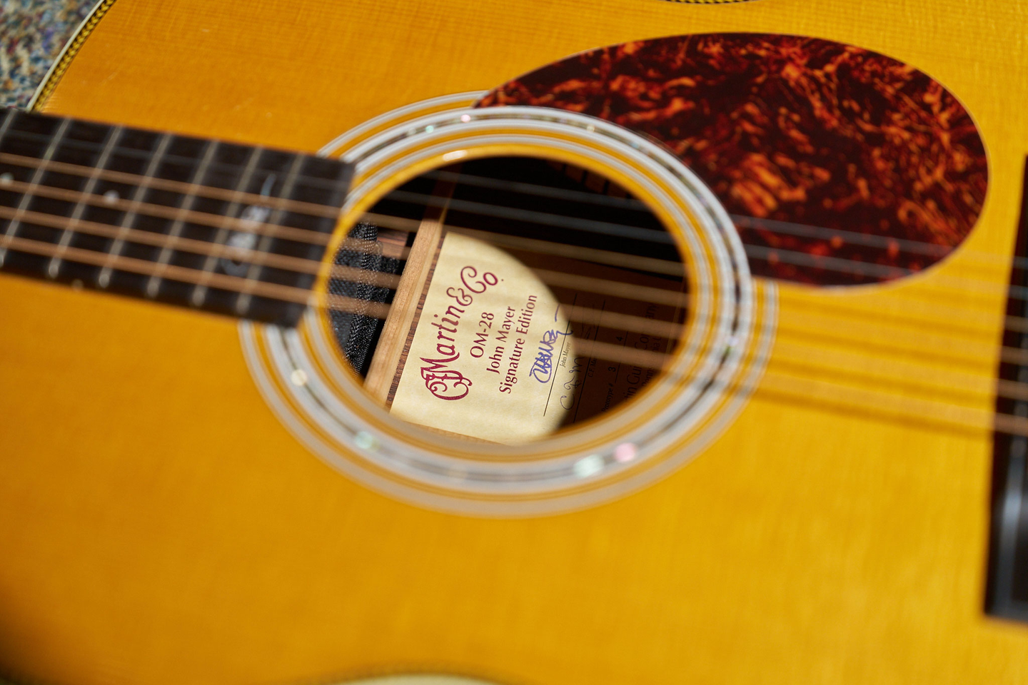 Photo of the label inside the John Mayer acoustic guitar
