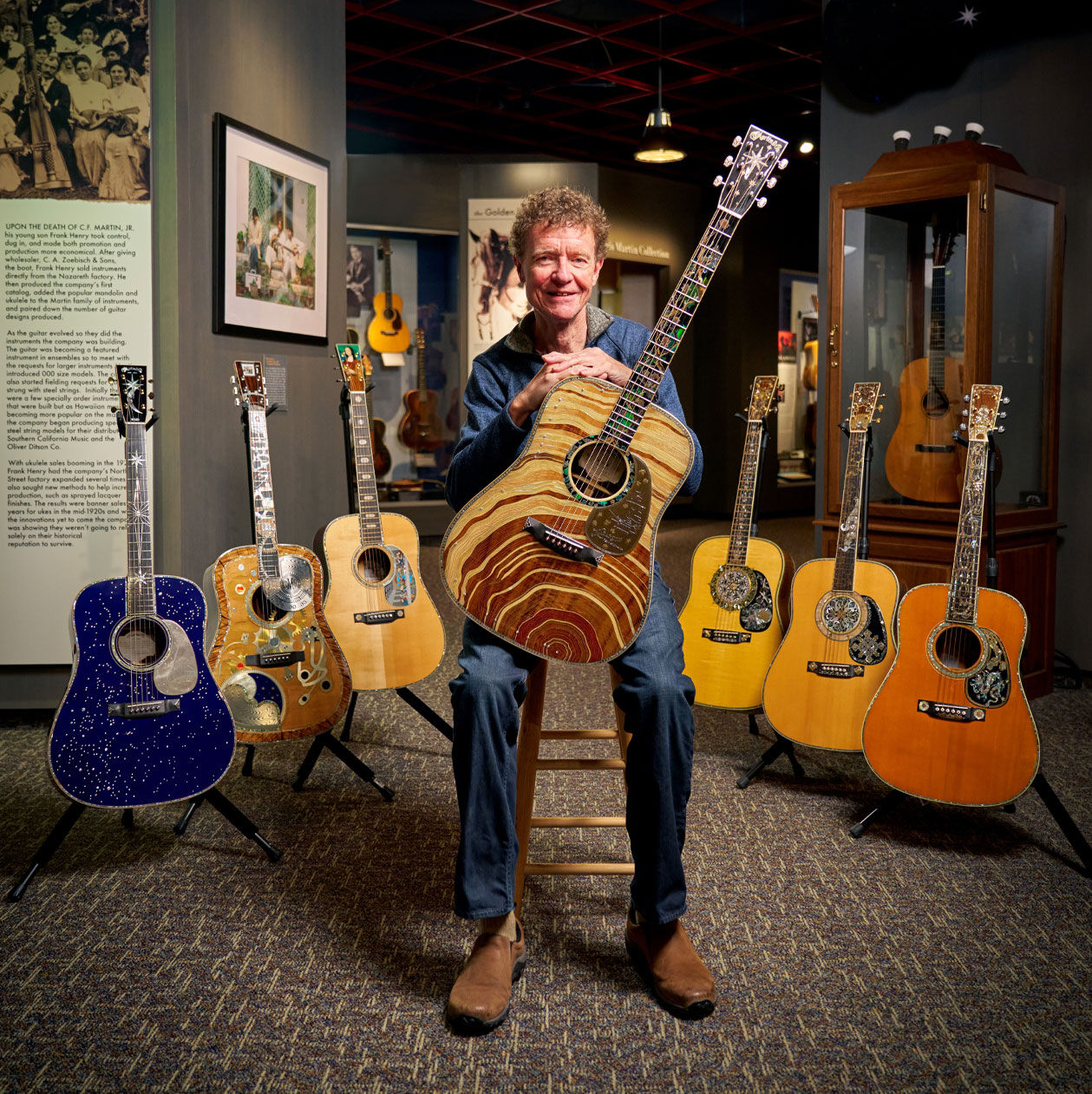 Chris Martin holding a D-3 Millionth acoustic guitar