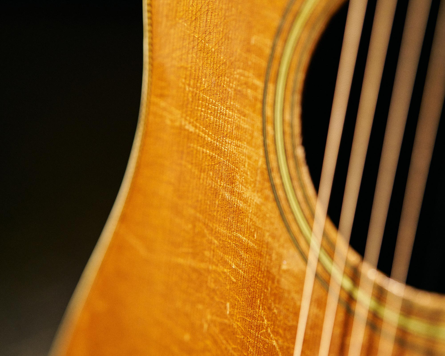 A closeup of the wear around the soundhole of Waylon Jennings' 1946 D-28